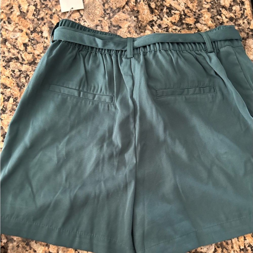 Green short with tag